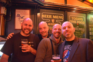 bald men at bar