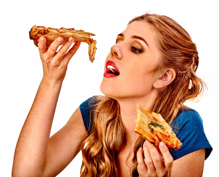 Woman eating Pizza