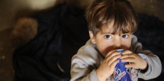 Child drinking soft drink
