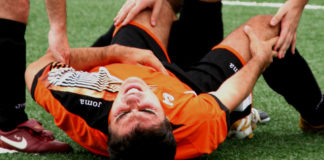 A player falling on ground due to cardiac arrest