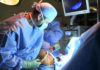 Doctors perform video surgery