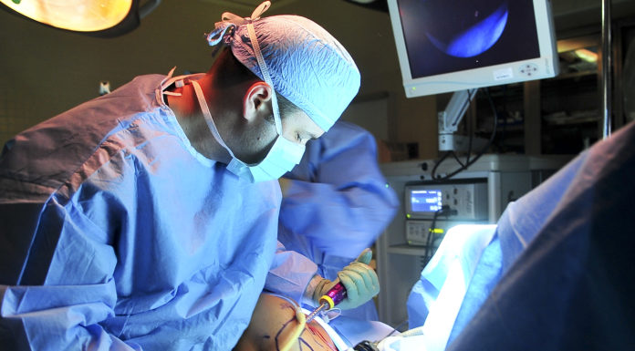 Doctors perform video surgery