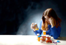 Woman with pills and medicines