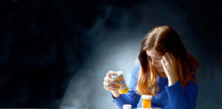 Woman with pills and medicines