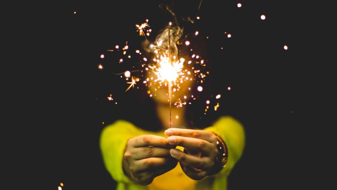 Girl with fire cracker, diwali, celebration