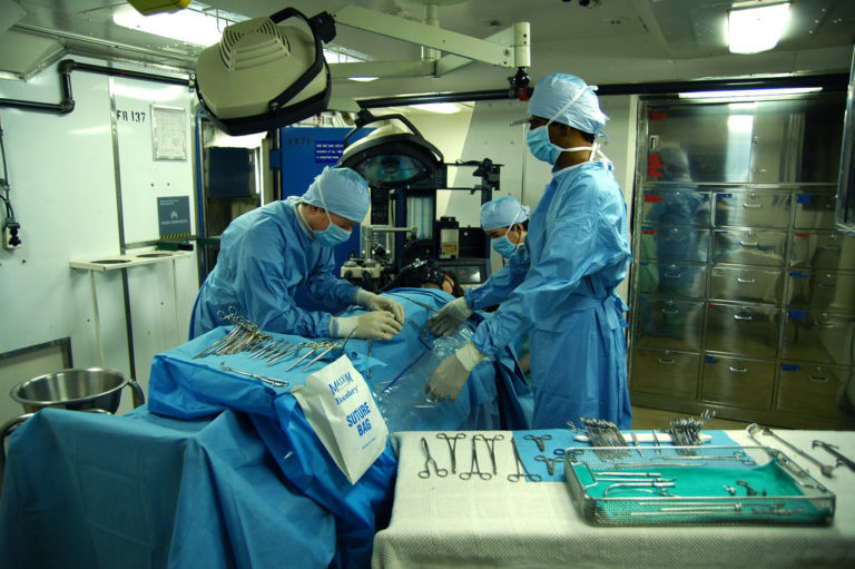 Doctors perform surgery in operation theatre