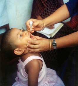 Child being administered Polio drops