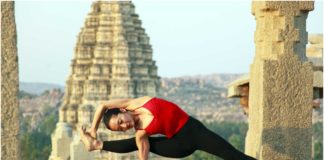 Lady practising yoga at Veerupaksha temple