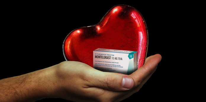 Hand holding heart with a pack of Montelukast