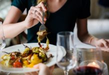 A woman eating Salad