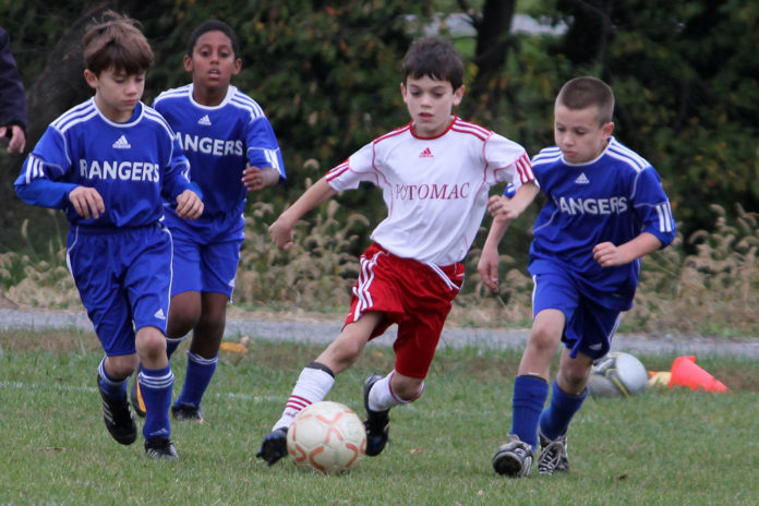 Kids playing football