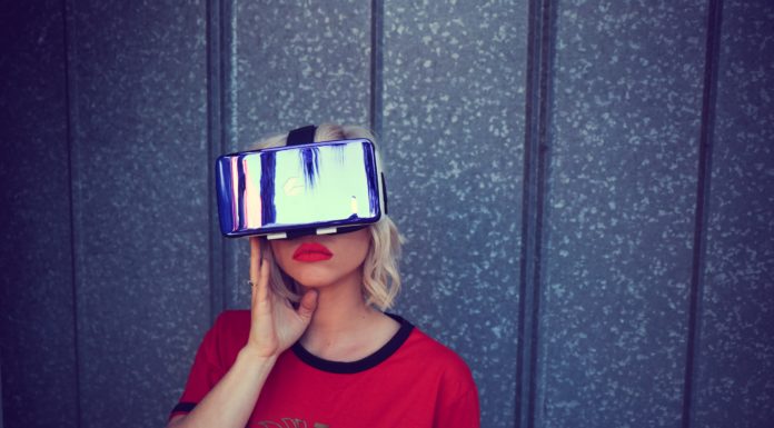 A woman using Virtual Reality headsets