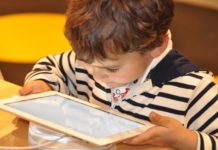 Screen time, child using tablet
