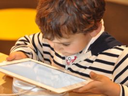 Screen time, child using tablet