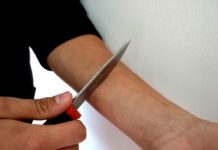 Self harm with knife