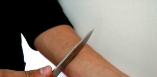 Self harm with knife