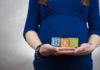 alphabet blocks hands mother pregnancy pregnant woman